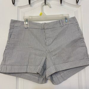 Selling pin stripped blue and white shorts